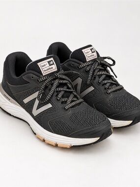 New Balance woman’s Black and White TechRide Athletic Sneakers